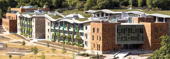 UWC Dilijan College by Tim Flynn Architects, Armenia’s first BREEAM building, BREEAM in eastern Europe, tufa limestone architecture, green-roofed university, Armenia university architecture, energy efficient school, UWC Dilijan College