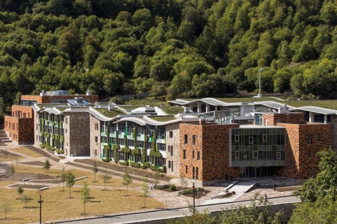 UWC Dilijan College by Tim Flynn Architects, Armenia’s first BREEAM building, BREEAM in eastern Europe, tufa limestone architecture, green-roofed university, Armenia university architecture, energy efficient school, UWC Dilijan College