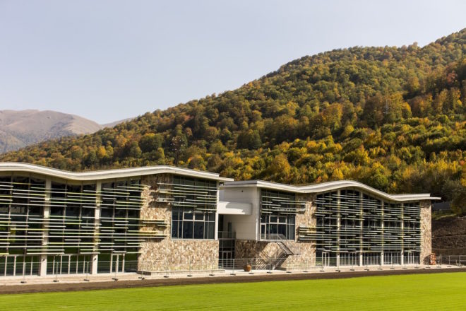 UWC Dilijan College by Tim Flynn Architects, Armenia’s first BREEAM building, BREEAM in eastern Europe, tufa limestone architecture, green-roofed university, Armenia university architecture, energy efficient school, UWC Dilijan College