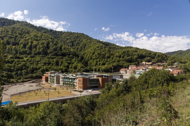 UWC Dilijan College by Tim Flynn Architects, Armenia’s first BREEAM building, BREEAM in eastern Europe, tufa limestone architecture, green-roofed university, Armenia university architecture, energy efficient school, UWC Dilijan College