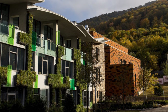 UWC Dilijan College by Tim Flynn Architects, Armenia’s first BREEAM building, BREEAM in eastern Europe, tufa limestone architecture, green-roofed university, Armenia university architecture, energy efficient school, UWC Dilijan College