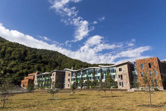 UWC Dilijan College by Tim Flynn Architects, Armenia’s first BREEAM building, BREEAM in eastern Europe, tufa limestone architecture, green-roofed university, Armenia university architecture, energy efficient school, UWC Dilijan College