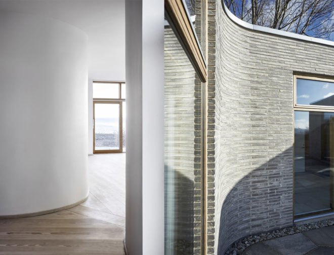 Villa Platan by ADEPT, Villa by the Sea by ADEPT, Kattegat sea architecture, Kolumba brick architecture, curved Kolumba brick, curved bricks, bespoke brick architecture, gray brick house, green-roofed Danish architecture