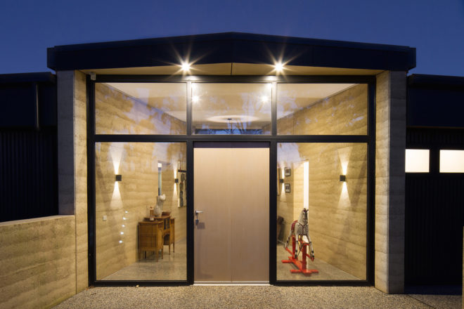 modern house in the countryside, modern house in Willow Grove, Willow Grove by Finnis Architects, rammed earth house in Australia, contemporary Australian architecture, modern eco-friendly homes in Australia,