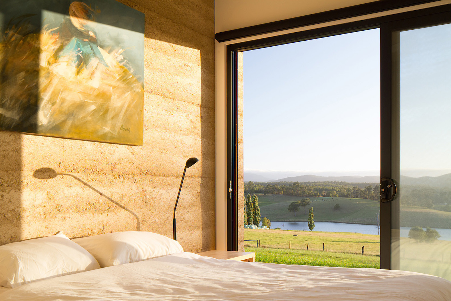 modern house in the countryside, modern house in Willow Grove, Willow Grove by Finnis Architects, rammed earth house in Australia, contemporary Australian architecture, modern eco-friendly homes in Australia,