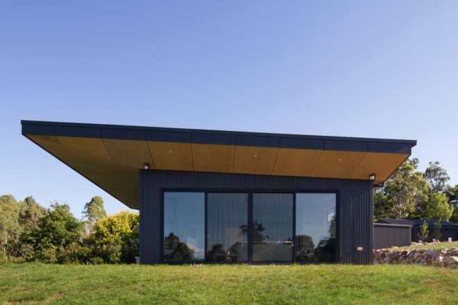 modern house in the countryside, modern house in Willow Grove, Willow Grove by Finnis Architects, rammed earth house in Australia, contemporary Australian architecture, modern eco-friendly homes in Australia,