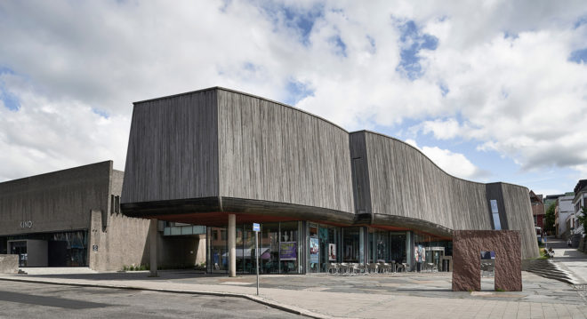 Snøhetta, Lillehammer Art Museum and Lillehammer Cinema, green extension, museum extension, stainless steel, Bård Breivik, green renovation, glass facade, transparent facade, auditorium