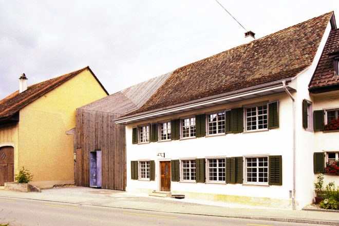 Marazzi Reinhardt, wooden façade, green home extension, Haus Zur Blume, historical home extension, Switzerland, slatted wooden façade, modern extension