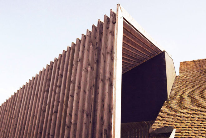 Marazzi Reinhardt, wooden façade, green home extension, Haus Zur Blume, historical home extension, Switzerland, slatted wooden façade, modern extension