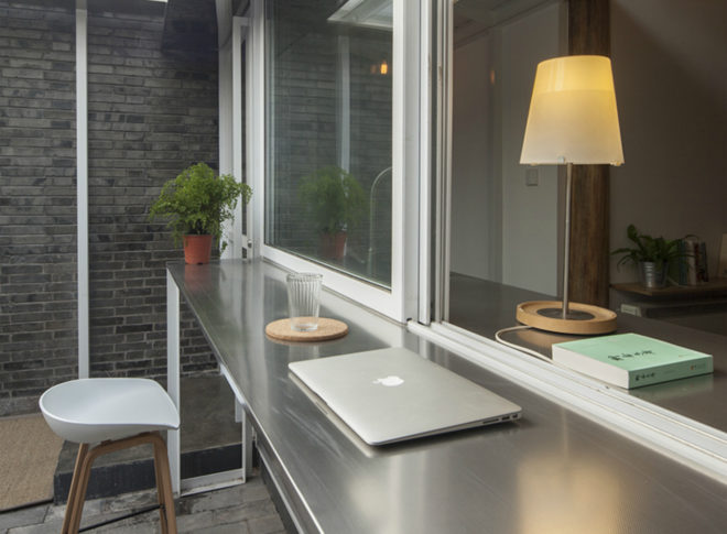 OEU-ChaO, tiny homes, tiny home renovation, bejing architecture, tiny home design, home renovation, small home movement, minimalist design, wooden roofs, sloped roof, compact spaces, space saving techniques, minimalist architecture, home renovation