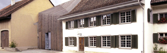 Marazzi Reinhardt, wooden façade, green home extension, Haus Zur Blume, historical home extension, Switzerland, slatted wooden façade, modern extension