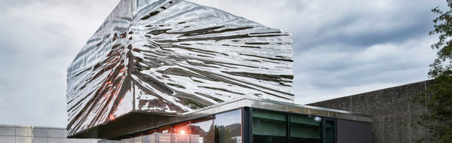 Snøhetta, Lillehammer Art Museum and Lillehammer Cinema, green extension, museum extension, stainless steel, Bård Breivik, green renovation, glass facade, transparent facade, auditorium