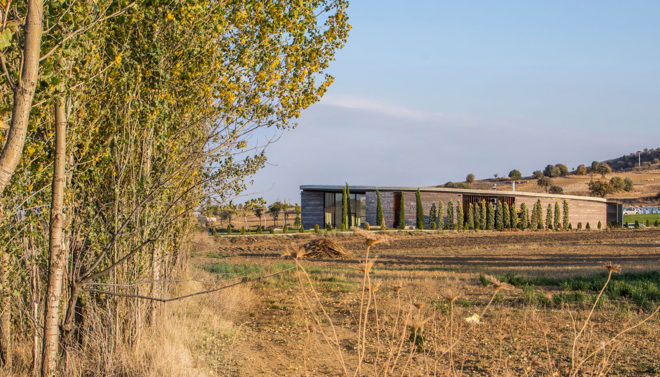 Farm of 38° 30°, Slash Architects, Arkizon Architects, dairy factory, Turkey, showroom, courtyard, natural light, locally sourced materials, natural stone, green architecture, Corten steel