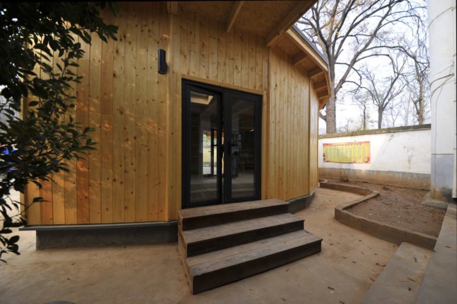 Tsiaogou reading room by SLOW Architects, SLOW Architects reading room, Tsiaogou library, library architecture for children, wooden reading room, fan-shaped architecture made from wood, low-tech Chinese timber architecture