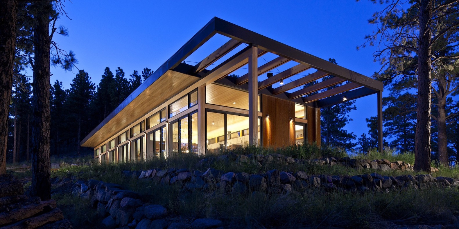 Boulder Cabin by Dynia Architects, contemporary boulder cabin, cabin with views of Flatiron, cabin with minimal site impact, minimize energy use cabin, weathered steel cladding, site specific cabin design, modern cabin design, contemporary timber cabin, steel clad cabin