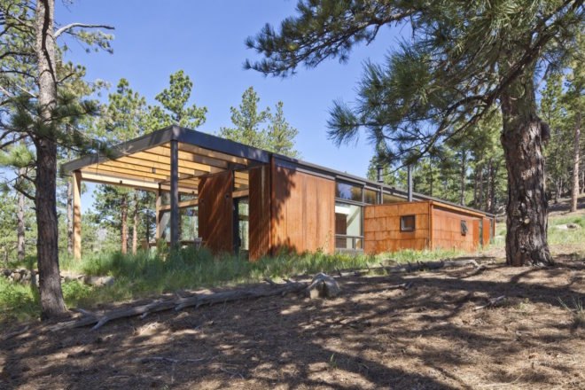 Boulder Cabin by Dynia Architects, contemporary boulder cabin, cabin with views of Flatiron, cabin with minimal site impact, minimize energy use cabin, weathered steel cladding, site specific cabin design, modern cabin design, contemporary timber cabin, steel clad cabin