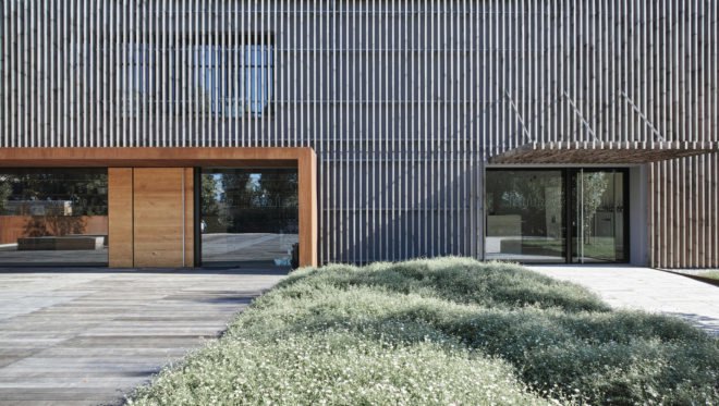 MADE Associati Architetti, New BIO Winery, beechwood, timber cladding, winery, Italy, organic wine, green architecture, wooden planks, timber façade, green renovation, biodiversity, locally sourced timber, sustainably harvested wood
