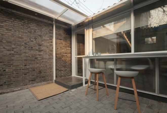 OEU-ChaO, tiny homes, tiny home renovation, bejing architecture, tiny home design, home renovation, small home movement, minimalist design, wooden roofs, sloped roof, compact spaces, space saving techniques, minimalist architecture, home renovation