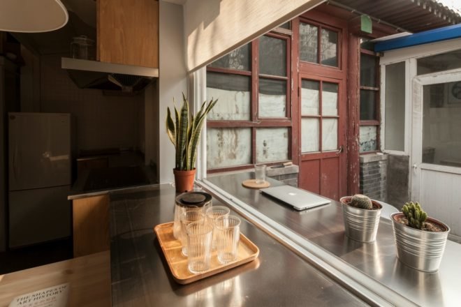 OEU-ChaO, tiny homes, tiny home renovation, bejing architecture, tiny home design, home renovation, small home movement, minimalist design, wooden roofs, sloped roof, compact spaces, space saving techniques, minimalist architecture, home renovation