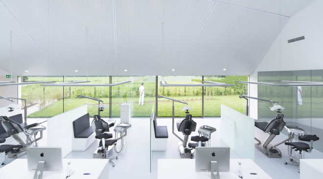 Ortho Wijchen, dental clinic, natural light, birch, wood furniture, Studio Prototype, skylights, green architecture, the Netherlands