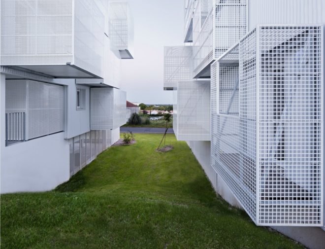Poggi + More, More Architecture, social housing, white clouds social housing, social design, urban design, architecture, green design, community-focused design, low income housing, block homes, screen balconies, french social housing, urban architecture