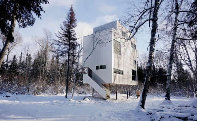 Pole House, DIN Projects, house on stilts, Canada, cottage, stilts, recycled pipes, green architecture, Lake Winnipeg, wood-burning stove