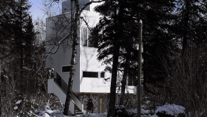 Pole House, DIN Projects, house on stilts, Canada, cottage, stilts, recycled pipes, green architecture, Lake Winnipeg, wood-burning stove