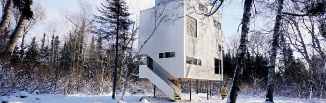 Pole House, DIN Projects, house on stilts, Canada, cottage, stilts, recycled pipes, green architecture, Lake Winnipeg, wood-burning stove