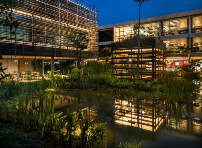 WOHA Architects, Enabling Village, Bukit Merah Vocational Institute, universal design, upcycled materials, timber building materials, singapore architecture, recycled oil drum planters, recycled building materials, green building, water gardens, landscape architecture, landscape design, all-inclusive design,