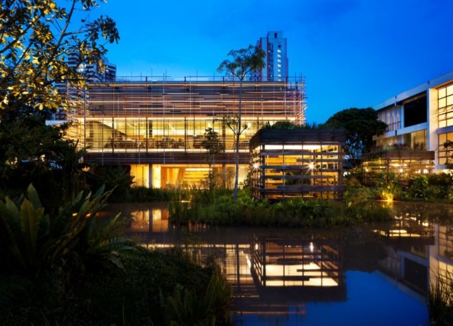 WOHA Architects, Enabling Village, Bukit Merah Vocational Institute, universal design, upcycled materials, timber building materials, singapore architecture, recycled oil drum planters, recycled building materials, green building, water gardens, landscape architecture, landscape design, all-inclusive design,