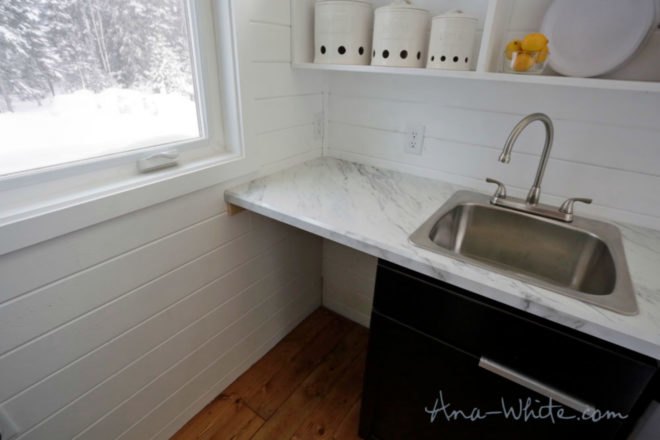 tiny houses, ana white, elevator bed, tiny home design, camper living, tiny home living, space saving furniture, flexible furniture, elevator bed desing, sliding storage, compact living, small living, minimal living, tiny home space, tiny home alaska, fold out bed, alaska tiny home