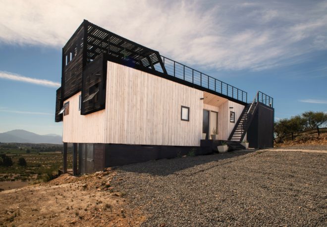 B+V Architects, Folding House, Folding House Chile, climate-controlled homes, responsive design, home design, passive cooling techniques, passive cooling technology, passive cooling, passive homes, energy efficient home design, green design, sustainable design, efficient design, home design, architecture, wooden shade, wooden facade,