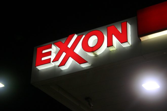 ExxonMobil, Exxon, Darren Woods, Paris climate accord, carbon tax