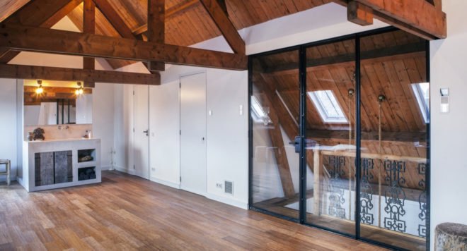Atelier Space, adaptive reuse, converted nursery, the Netherlands, solar power, solar panels, green residence, skylights, radiant flooring, insulation, heat pump, high ceilings, green interior