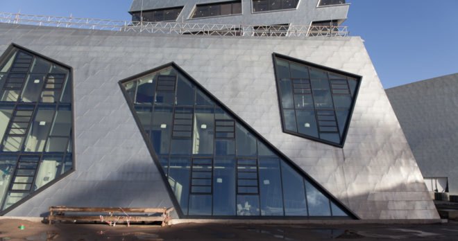 Leuphana Central Building, Studio Libeskind, green roof, Germany, zinc cladding, zero-emission, atrium, skylights, green architecture, exposed concrete, renewable energy sources