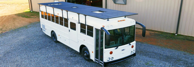 Natural State Nomads, converted school bus, solar-powered vehicle, green conversion, mobile home, solar power, composting toilet, green transportation