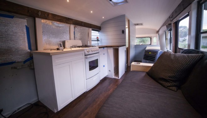 Natural State Nomads, converted school bus, solar-powered vehicle, green conversion, mobile home, solar power, composting toilet, green transportation
