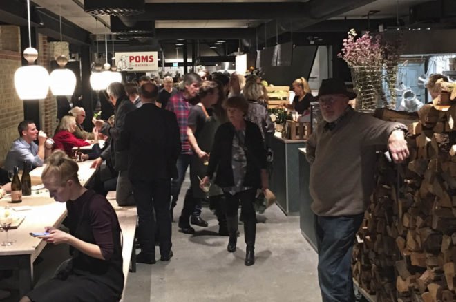 warehouse renovated into food hall, market hall adaptive reuse, Malmö Market Hall, Malmo Market Hall by Wingardh, Nina Totté Karyd and Martin Karyd, Corten steel clad market hall, corten steel in adaptive reuse,