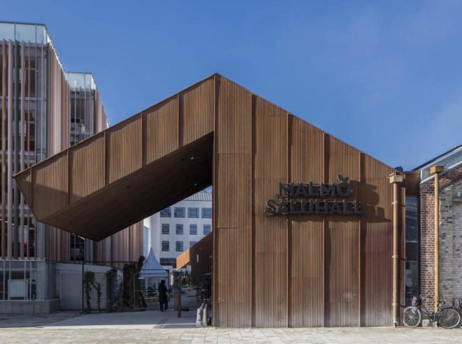 warehouse renovated into food hall, market hall adaptive reuse, Malmö Market Hall, Malmo Market Hall by Wingardh, Nina Totté Karyd and Martin Karyd, Corten steel clad market hall, corten steel in adaptive reuse,