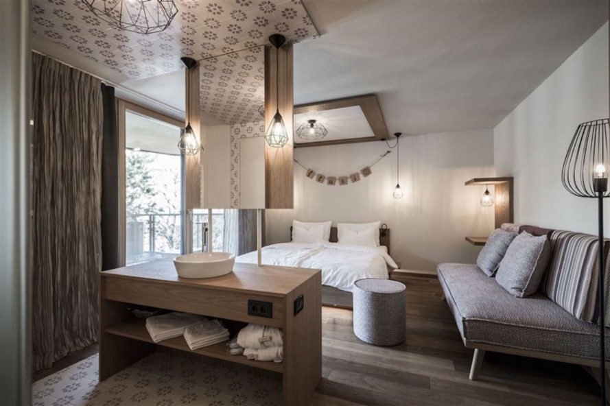 Tofana Hotel by NOA, Tofana Hotel architecture, Tofana Hotel in the Dolomites, Dolomite contemporary architecture, Badia Valley, hotel with natural materials, mountain-inspired architecture