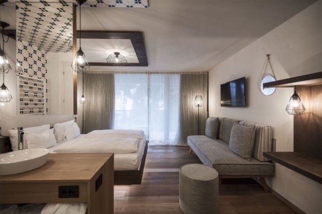 Tofana Hotel by NOA, Tofana Hotel architecture, Tofana Hotel in the Dolomites, Dolomite contemporary architecture, Badia Valley, hotel with natural materials, mountain-inspired architecture