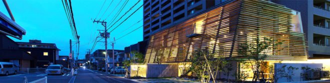 Wow! Sta., Takeru Shoji Architects, multipurpose architecture, mixed-use building wrapped in wooden louvers, commercial building in Niigata City, commercial building with an indoor garden