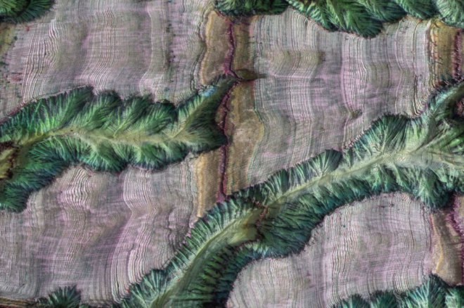 Book landscapes by Guy Laramee, repurposed book art, recycled book art, book sculptures, landscapes in books, book world art, Guy Laramée art, Guy Laramée,