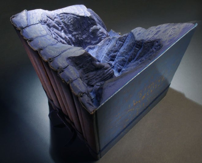 Book landscapes by Guy Laramee, repurposed book art, recycled book art, book sculptures, landscapes in books, book world art, Guy Laramée art, Guy Laramée,