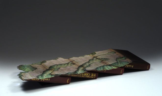 Book landscapes by Guy Laramee, repurposed book art, recycled book art, book sculptures, landscapes in books, book world art, Guy Laramée art, Guy Laramée,