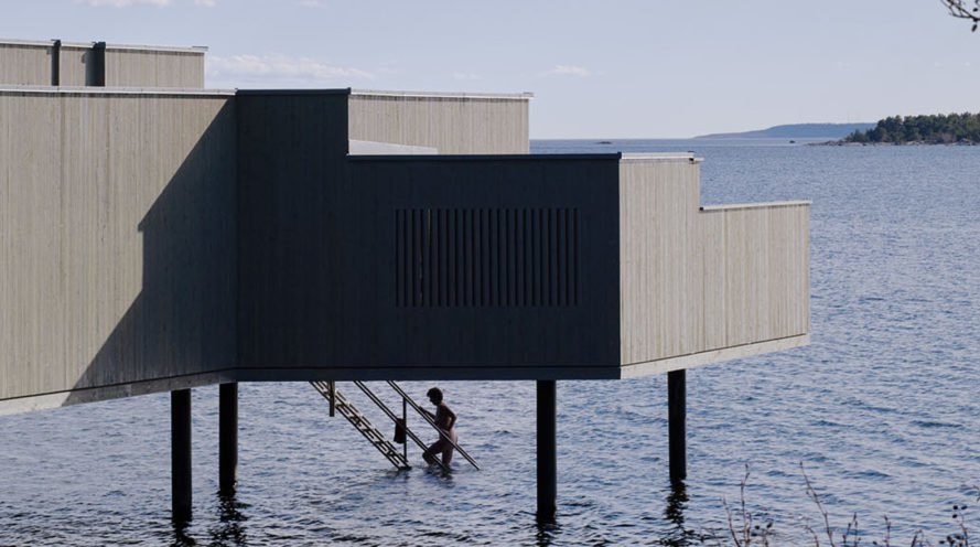 Kallbadhus, bath house, timber cladding, Sweden, Kallbadhusets Vänner, White Arkitekter, green architecture, sauna, glulam beams, bridge