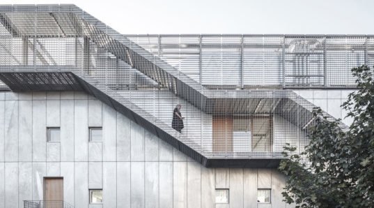 Architects cracked this concrete building to fill its interior with