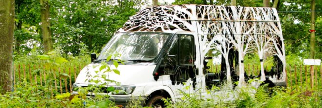 Dan Rawlings, Nature Delivers, art, van art, nature-inspired art, forest art, street sign art, urban art, vehicle art, Lost Eden festival, metal sculpture, art sculpture, metal cutting art, repurposed vans, urban artists, graffiti art,