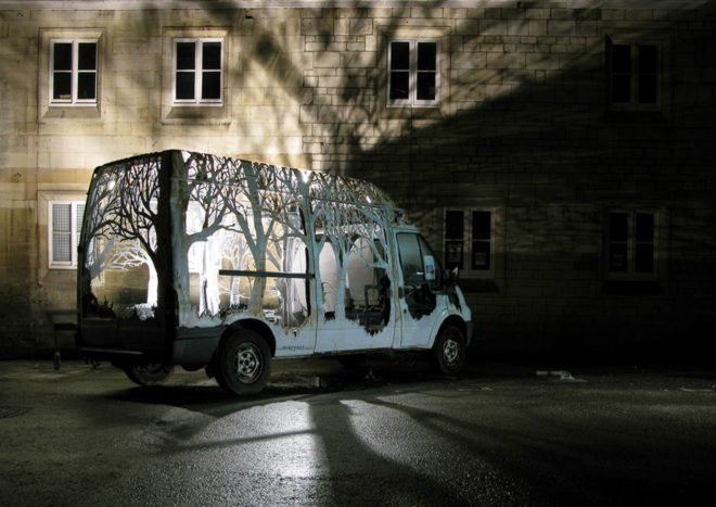 Dan Rawlings, Nature Delivers, art, van art, nature-inspired art, forest art, street sign art, urban art, vehicle art, Lost Eden festival, metal sculpture, art sculpture, metal cutting art, repurposed vans, urban artists, graffiti art,