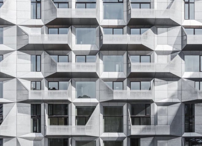 the Silo by COBE, The Silo Nordhavn, The Silo apartments, repurposed silo architecture, galvanized steel facade, adaptive reuse apartments, Nordhavn apartments, adaptive reuse silo